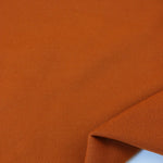 Load image into Gallery viewer, 1YD 2IN REMNANT; Burnt Orange Polartec Power Stretch Fleece

