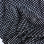 Load image into Gallery viewer, Black/White Mini Grid Stretch Twill
