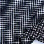 Load image into Gallery viewer, Black/White Mini Grid Stretch Twill
