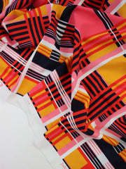 Load image into Gallery viewer, 1YD PRECUT; Mango/Pink/Red Plaid Nylon Spandex Tricot | Designer Deadstock
