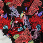 Load image into Gallery viewer, Scuba Adventure on Black Nylon Spandex Tricot | Designer Deadstock
