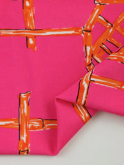 Load image into Gallery viewer, Bamboo Lattice on Hot Pink Nylon Spandex Tricot | Designer Deadstock
