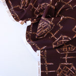 Load image into Gallery viewer, Bamboo Lattice on Dark Maroon Nylon Spandex Tricot | Designer Deadstock

