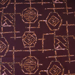 Load image into Gallery viewer, Bamboo Lattice on Dark Maroon Nylon Spandex Tricot | Designer Deadstock
