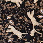 Load image into Gallery viewer, Leaping Leopards on Black Nylon Spandex Tricot | Designer Deadstock
