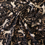 Load image into Gallery viewer, Leaping Leopards on Black Nylon Spandex Tricot | Designer Deadstock
