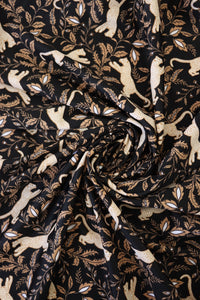 Leaping Leopards on Black Nylon Spandex Tricot | Designer Deadstock