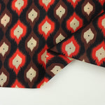 Load image into Gallery viewer, Candy Apple &amp; Mahogany Ikat Diamonds on Black Cotton Lawn | Designer Deadstock
