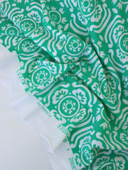 Load image into Gallery viewer, White Floral on Green Nylon Spandex Tricot | Designer Deadstock

