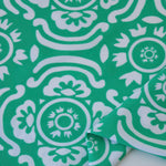 Load image into Gallery viewer, White Floral on Green Nylon Spandex Tricot | Designer Deadstock
