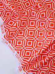 Load image into Gallery viewer, 1YD PRECUT; Intertwined on Orange Nylon Spandex Tricot | Designer Deadstock
