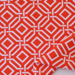Load image into Gallery viewer, 1YD PRECUT; Intertwined on Orange Nylon Spandex Tricot | Designer Deadstock
