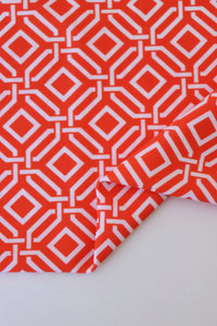 1YD PRECUT; Intertwined on Orange Nylon Spandex Tricot | Designer Deadstock