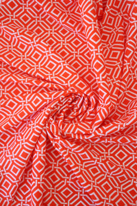 Intertwined on Orange Nylon Spandex Tricot | Designer Deadstock