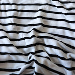 Load image into Gallery viewer, 1YD 30IN Black Stripe on Ivory Rayon Spandex Jersey | Kayla's Destash
