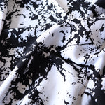 Load image into Gallery viewer, 1YD 16IN Black Splatter on White Rayon Challis | Kayla's Destash
