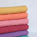 Load image into Gallery viewer, Celosia Yellow Interwoven Squares Quilted Knit | By The Half Yard
