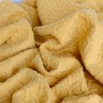 Load image into Gallery viewer, Celosia Yellow Interwoven Squares Quilted Knit | By The Half Yard
