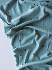 Load image into Gallery viewer, Tossed Hearts on Chambray Brushed Sweater Knit
