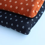 Load image into Gallery viewer, Flower Stamp on Black Double Brushed Poly
