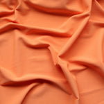 Load image into Gallery viewer, Cantaloupe Ribbed Polyester Spandex Tricot
