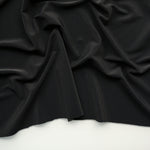 Load image into Gallery viewer, Black Ribbed Polyester Spandex Tricot
