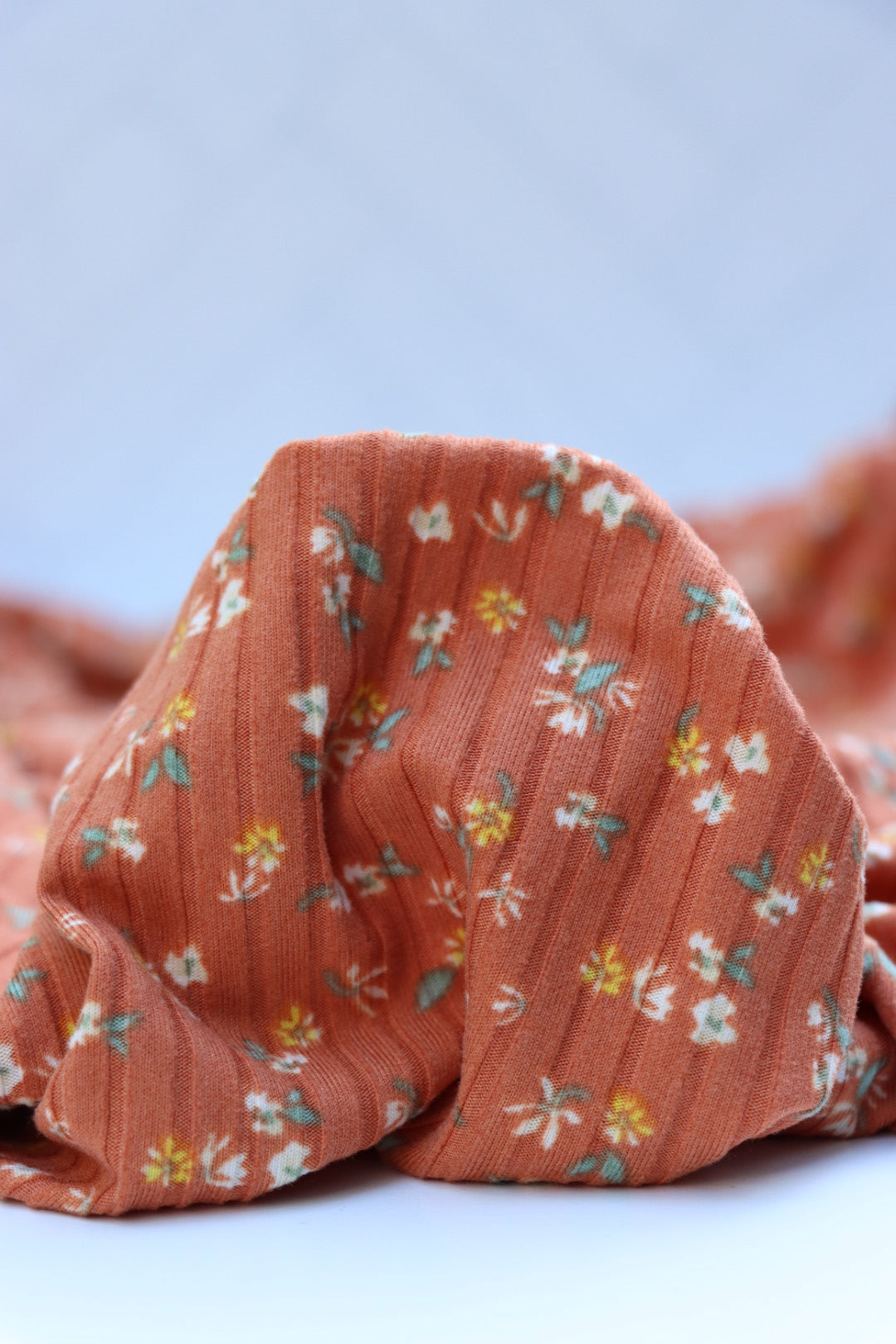 Mila on Burnt Orange Yummy 8x3 Rib Knit | Surge Fabric Shop