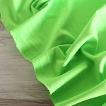 Load image into Gallery viewer, Neon Lime QUAD Performance Jersey Knit | By The Half Yard
