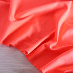 Load image into Gallery viewer, Hot Coral QUAD Performance Jersey Knit | By The Half Yard
