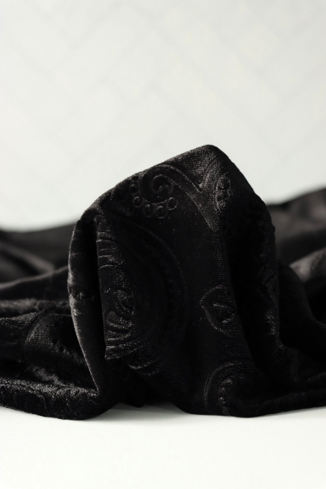 Black Paisley Embossed Stretch Velvet | Surge Fabric Shop