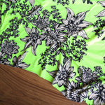 Load image into Gallery viewer, Betsy Floral on Neon Yellow Double Brushed Poly
