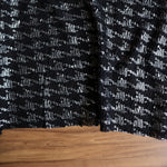 Load image into Gallery viewer, Black &amp; Silver Houndstooth Foil Sweater Knit
