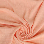 Load image into Gallery viewer, Pastel Peach Smocked Jersey Knit
