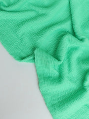 Load image into Gallery viewer, Bright Mint Smocked Jersey Knit