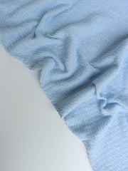 Load image into Gallery viewer, Pastel Blue Smocked Jersey Knit
