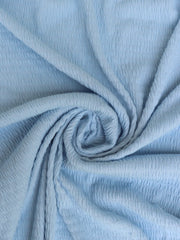 Load image into Gallery viewer, Pastel Blue Smocked Jersey Knit