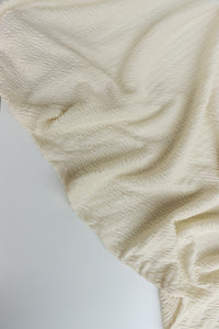 Cream Smocked Jersey Knit