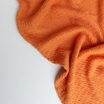 Load image into Gallery viewer, Orange Smocked Jersey Knit
