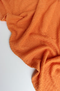 Orange Smocked Jersey Knit