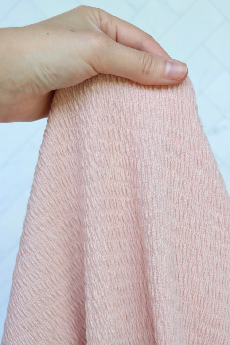 Pastel Pink Smocked Jersey Knit | Surge Fabric Shop Pastel Pink Smocked Jersey Knit | Surge Fabric Shop