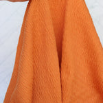 Load image into Gallery viewer, Orange Smocked Jersey Knit
