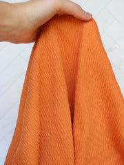 Load image into Gallery viewer, Orange Smocked Jersey Knit