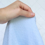 Load image into Gallery viewer, Pastel Blue Smocked Jersey Knit
