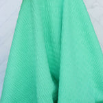 Load image into Gallery viewer, Bright Mint Smocked Jersey Knit
