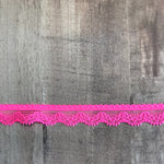 Load image into Gallery viewer, Neon Pink .5" Wide Stretch Lace
