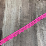Load image into Gallery viewer, Neon Pink .5" Wide Stretch Lace
